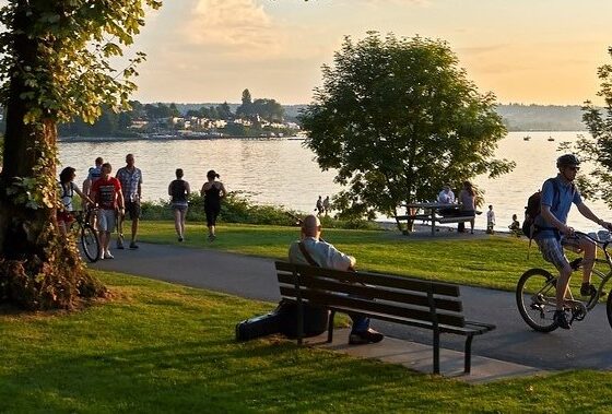 Young people biking and walking at Stanley Park