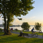 Young People Biking And Walking At Stanley Park