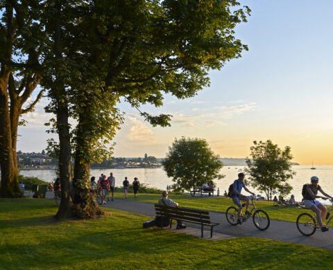 Young People Biking And Walking At Stanley Park