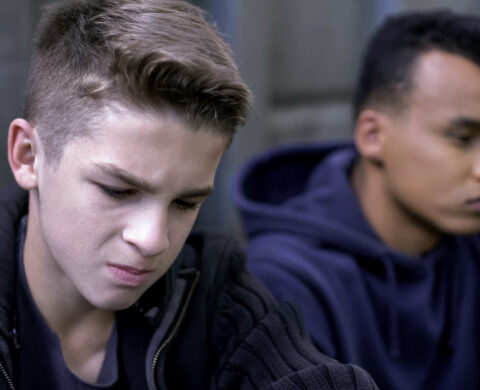 Two Sad Friends Sitting In Hideaway, Became Orphans, Children Of War, Crying