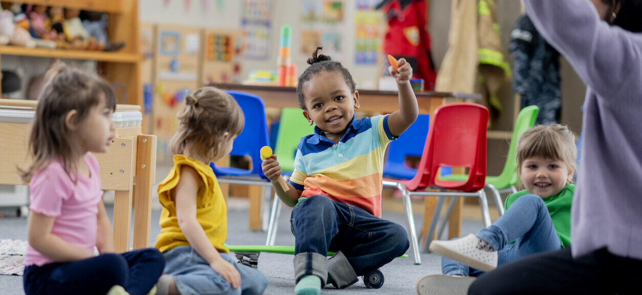 Preschool Children Participating In Classroom Activities In A Vibrant Learning Environment